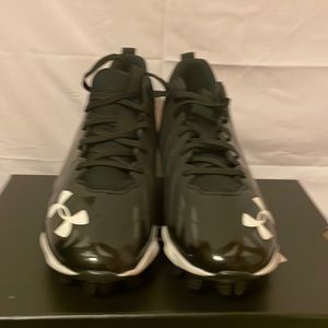 Black Under Armour football cleats.